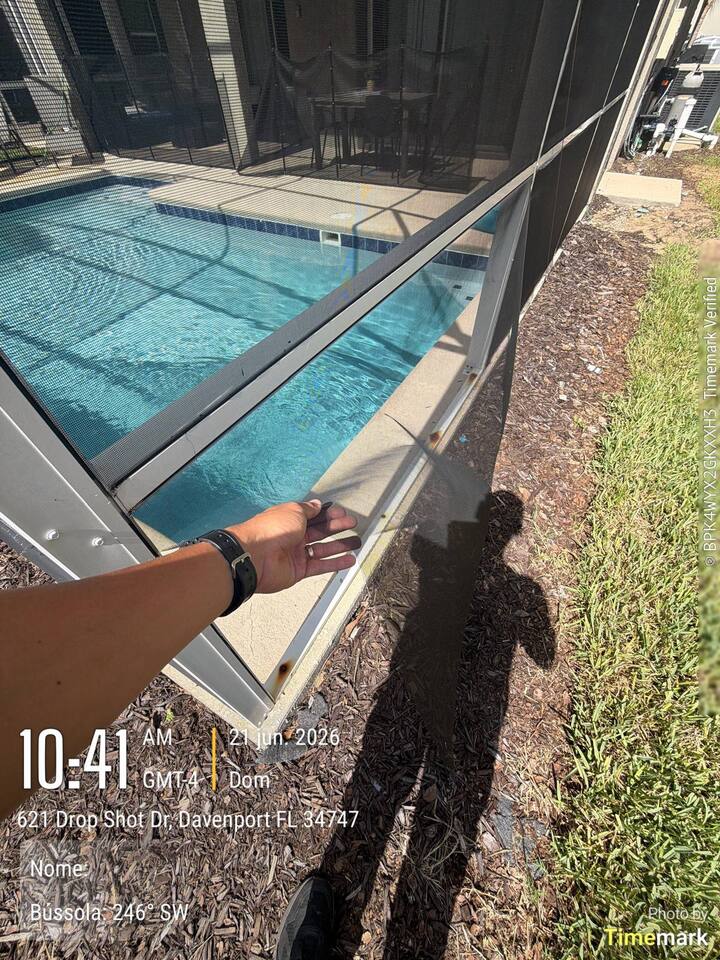 Loose pool enclosure screen in Davenport before repair