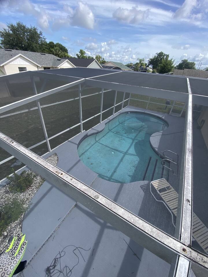 Completed pool enclosure rescreen in Davenport